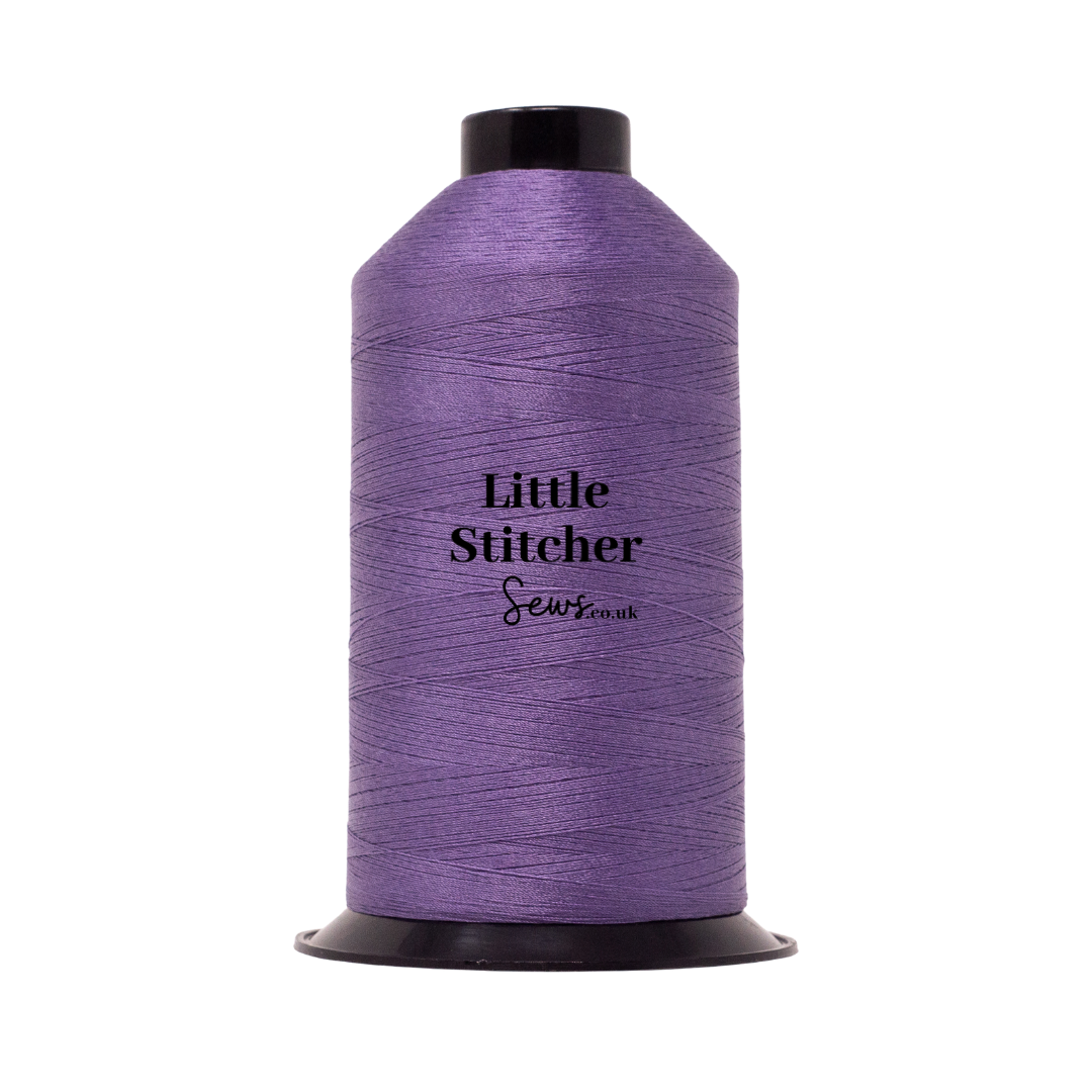 Spool of amethyst thread with 'Little Stitcher Sews' branding on a white background