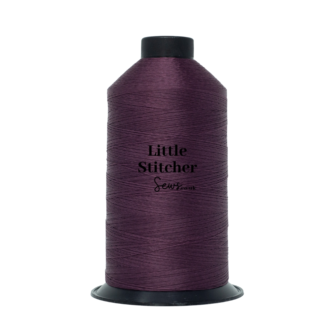 Spool of grape thread with 'Little Stitcher Sews' branding on a white background