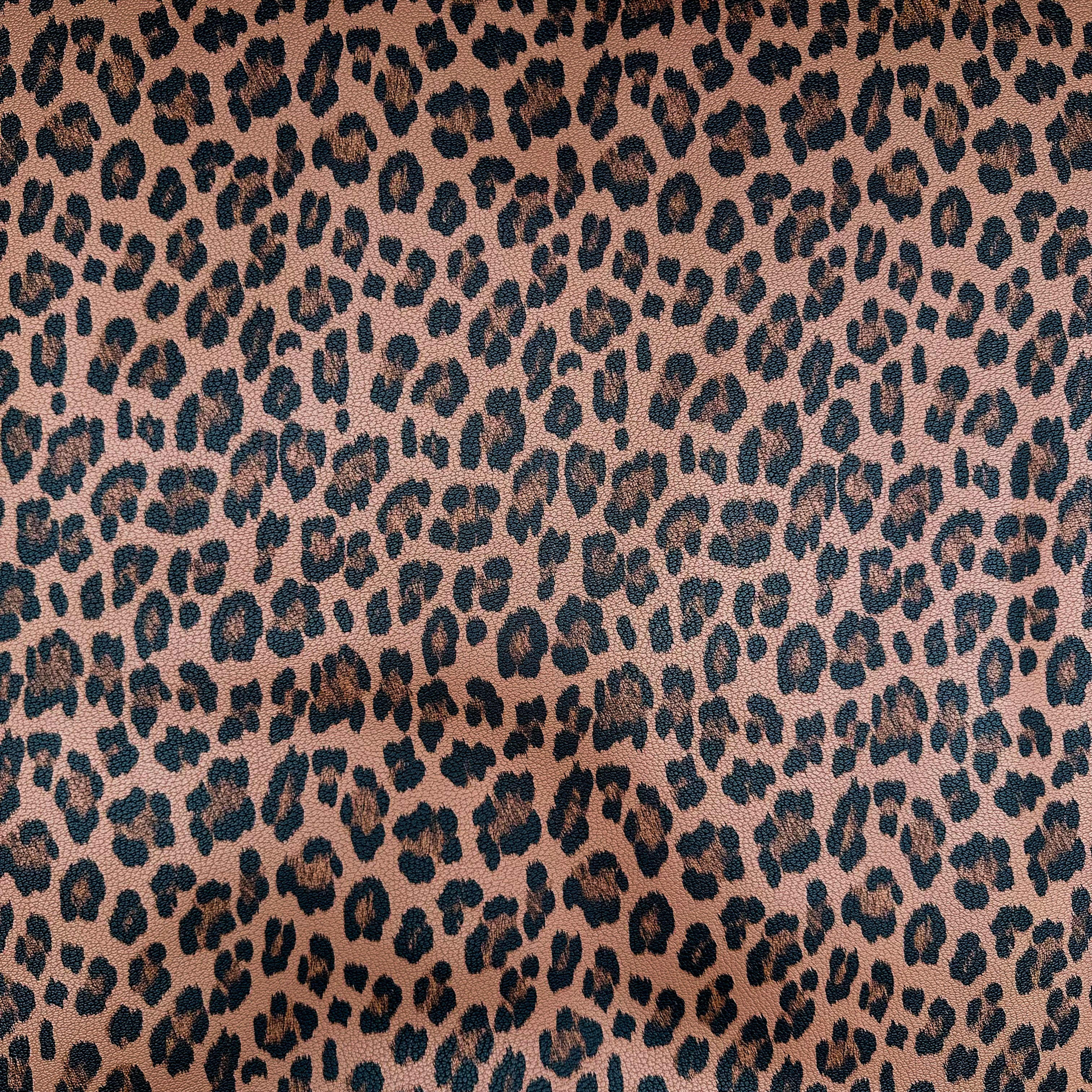 Leopard print pattern on a brown background