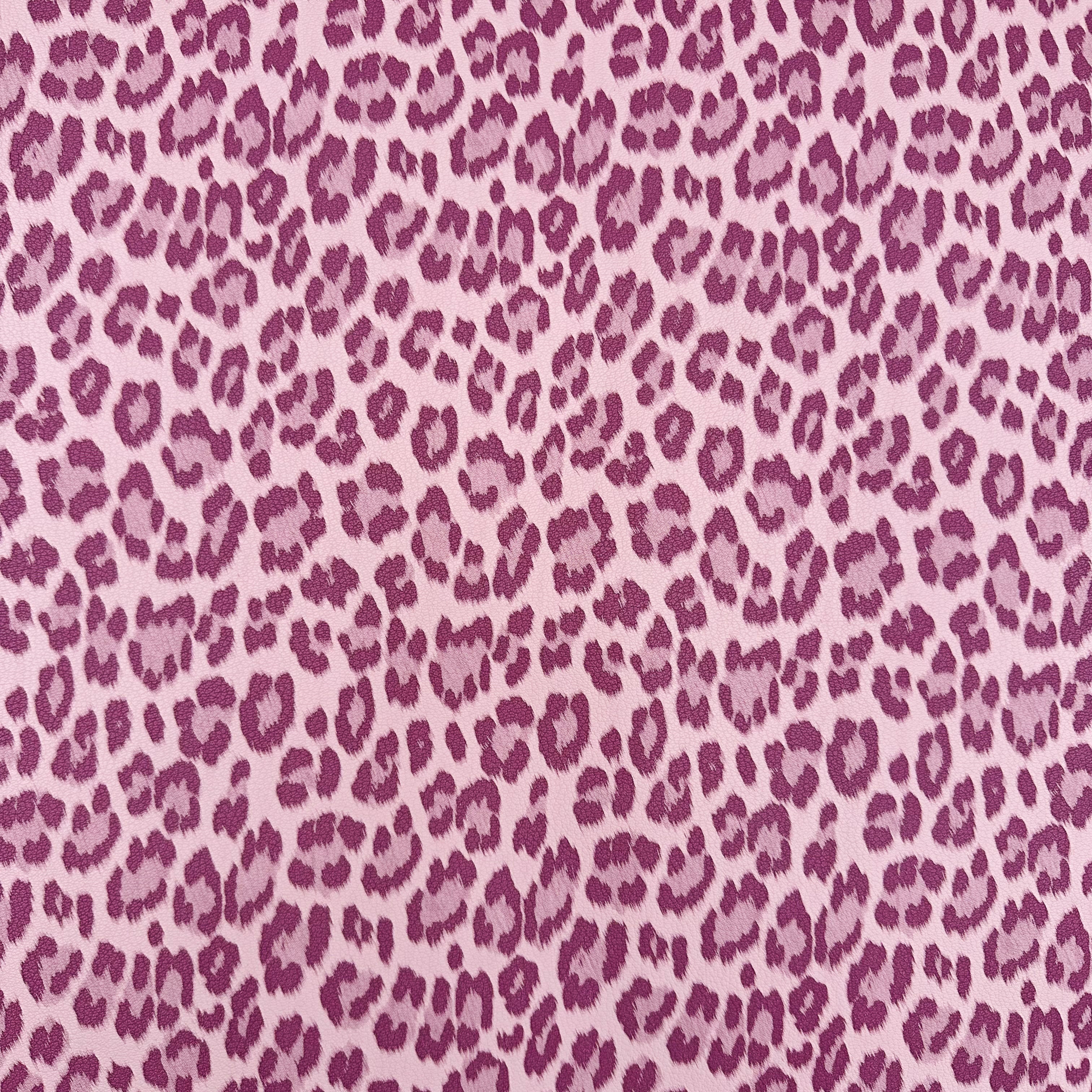 Pink leopard print pattern on a pink background