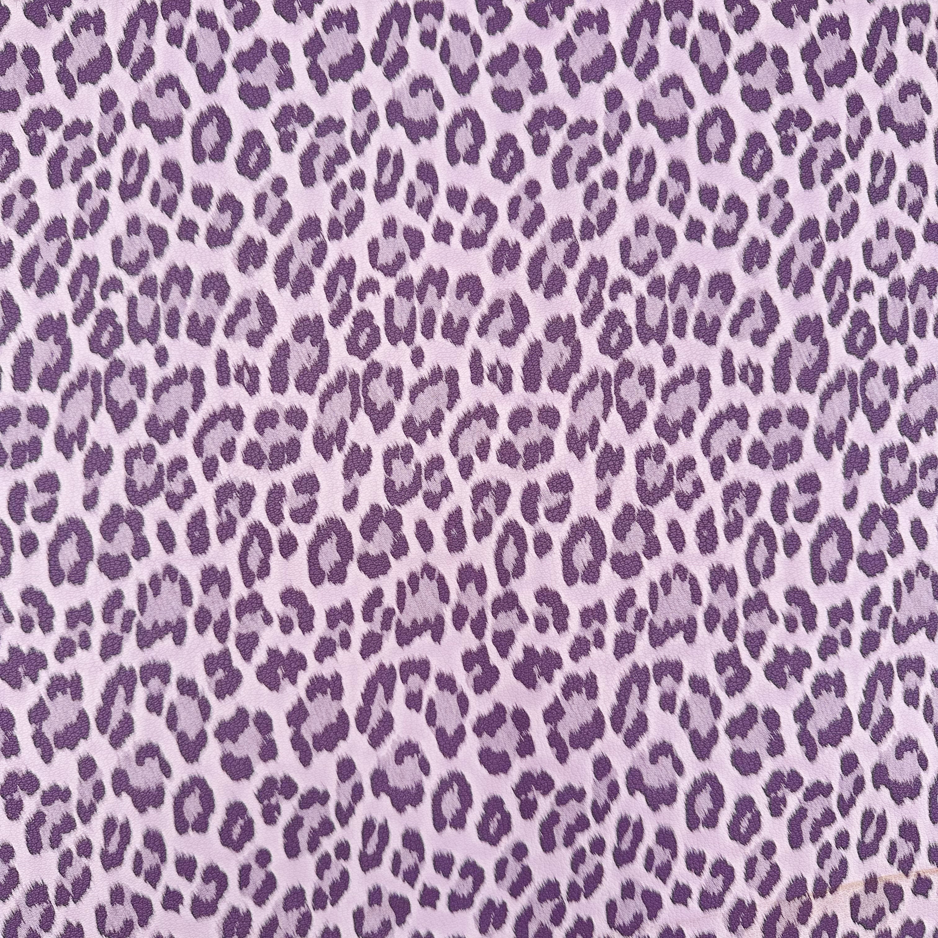Leopard print pattern on a lilac background